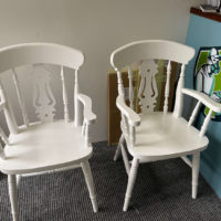 2 white chairs
