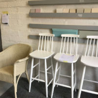 4 chairs. 1 cream, 3 white