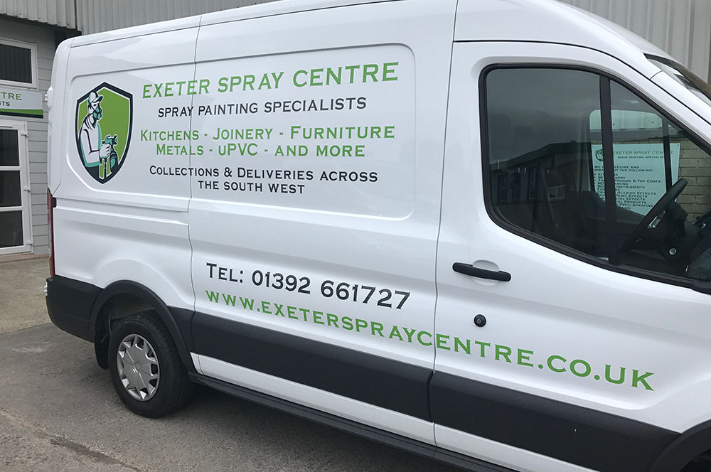 White van with Exeter Spray Centre logo on the side